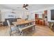 Open-concept floor plan with light wood floors, a modern kitchen, and a spacious dining area at 2049 E Leewynn Dr, Sarasota, FL 34240