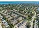 Aerial view of the property highlighting its location near the water and surrounding neighborhood at 220 Coquina Bay Dr, St Petersburg, FL 33705