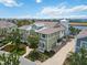 An inviting exterior view of a well-maintained property with a spacious layout and beautiful landscaping at 230 Sapphire Lake Dr # 201, Bradenton, FL 34209