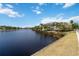 Scenic waterfront view with lush landscaping and stunning Florida architecture in a beautiful setting at 230 Sapphire Lake Dr # 201, Bradenton, FL 34209