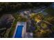 Aerial view of tennis courts, swimming pool, and clubhouse at 2301 Little Country Rd, Parrish, FL 34219