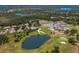 Aerial view of a home with proximity to the club house, golf course and the Manatee River at 2301 Little Country Rd, Parrish, FL 34219