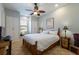 Cozy bedroom featuring natural light, a ceiling fan, and built-in storage for a relaxing retreat at 2301 Little Country Rd, Parrish, FL 34219
