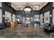 Clubhouse lobby with grand architecture, high end decor and seating at 2301 Little Country Rd, Parrish, FL 34219