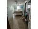 Relaxing bedroom with tile flooring, ceiling fan, and neutral walls at 300 N 22Nd St, Bradenton Beach, FL 34217