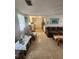 Spacious open concept living room with tile flooring flowing into the kitchen at 300 N 22Nd St, Bradenton Beach, FL 34217