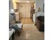 Open floor plan showcasing living room with kitchen featuring tile floors at 300 N 22Nd St, Bradenton Beach, FL 34217