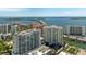 Breathtaking aerial view of waterfront condos with bridge access to surrounding coastal areas at 301 Quay Commons # 1709, Sarasota, FL 34236
