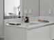 Bright bathroom featuring a modern vanity with sleek fixtures and plenty of counter space at 301 Quay Commons # 1709, Sarasota, FL 34236
