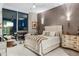 Stylishly appointed bedroom with a stunning view, featuring a decorative faux fur throw and bedside table at 301 Quay Commons # 1709, Sarasota, FL 34236