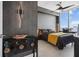 Bedroom showcasing luxurious decor with textured wallpaper, modern lighting, and scenic city views at 301 Quay Commons # 1709, Sarasota, FL 34236