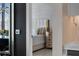 View into a bedroom with a modern bed and neutral decor at 301 Quay Commons # 1709, Sarasota, FL 34236