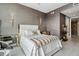 Bedroom featuring elegant decor, neutral colors, accent lighting, and luxury finishes at 301 Quay Commons # 1709, Sarasota, FL 34236