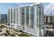 Stunning high-rise condo building with modern architectural design and ample balconies at 301 Quay Commons # 1709, Sarasota, FL 34236