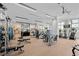 State-of-the-art gym with modern fitness equipment and plenty of space for activities at 301 Quay Commons # 1709, Sarasota, FL 34236