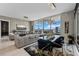 Bright living room featuring floor-to-ceiling windows and elegant decor at 301 Quay Commons # 1709, Sarasota, FL 34236