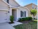 Charming home exterior featuring a well-manicured lawn and welcoming entrance at 309 Blue Point Dr, Ruskin, FL 33570