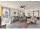 Bright and airy living room with a large sectional sofa and modern decor at 309 Blue Point Dr, Ruskin, FL 33570