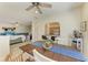 Inviting dining area with hardwood table, ceiling fan, and natural light, perfect for Gathering meals at 311 Cape Harbour Loop # 108, Bradenton, FL 34212
