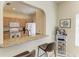 Eat-in kitchen bar and granite countertops provide functionality and style for casual dining and meal prep at 311 Cape Harbour Loop # 108, Bradenton, FL 34212