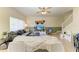 Bright and airy living room featuring comfortable seating, ceiling fan, and stylish decor at 311 Cape Harbour Loop # 108, Bradenton, FL 34212