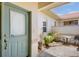 Inviting front porch showcasing seating area and a cozy outdoor space at 3412 E Chelmsford Ct # 42, Sarasota, FL 34235