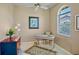 Cozy home office features natural light, a neutral color scheme, and stylish decor at 3412 E Chelmsford Ct # 42, Sarasota, FL 34235