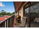 Relaxing balcony features comfortable seating and overlooks the beautiful tree tops and neighborhood at 3420 Wild Oak Bay Blvd # 120, Bradenton, FL 34210