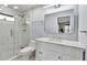 Modern bathroom with marble tile shower, updated vanity, and contemporary fixtures at 3420 Wild Oak Bay Blvd # 120, Bradenton, FL 34210