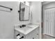 Modern bathroom featuring a white vanity with marble countertop and sleek black fixtures at 3420 Wild Oak Bay Blvd # 120, Bradenton, FL 34210