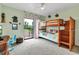 Charming bedroom with bunk beds and a sliding glass door to the outside at 3420 Wild Oak Bay Blvd # 120, Bradenton, FL 34210