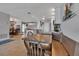 Open-concept kitchen connected to dining and lounge, with stainless steel appliances and tile flooring at 3420 Wild Oak Bay Blvd # 120, Bradenton, FL 34210