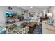 Inviting living room with tile floors, and comfortable seating arrangement, ideal for relaxation and gatherings at 3420 Wild Oak Bay Blvd # 120, Bradenton, FL 34210