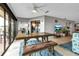 Bright living room boasts stylish furnishings, tile flooring, and sliding glass doors to the outdoor balcony at 3420 Wild Oak Bay Blvd # 120, Bradenton, FL 34210