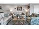 Comfortable living room with tile flooring, plenty of seating, and tasteful decor for a welcoming ambiance at 3420 Wild Oak Bay Blvd # 120, Bradenton, FL 34210