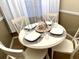 Cozy dining area with seating for four and natural light at 3506 54Th W Dr # 103, Bradenton, FL 34210