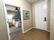 Inviting foyer showing the bedroom, with a ceiling fan, providing a warm welcome at 3506 54Th W Dr # 103, Bradenton, FL 34210