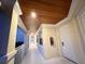 Hallway with white trim, neutral walls, and wood ceiling at 3506 54Th W Dr # 103, Bradenton, FL 34210