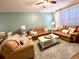 Cozy living room with comfortable seating, perfect for relaxing or entertaining guests at 3506 54Th W Dr # 103, Bradenton, FL 34210