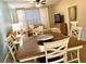 Inviting living space features living and dining areas with natural light and comfortable seating at 3506 54Th W Dr # 103, Bradenton, FL 34210