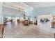 Spacious community room with high ceilings, comfortable seating arrangements, and ample natural light at 3690 Pinecrest St # 114, Sarasota, FL 34232