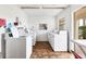 Clean and functional laundry room with multiple washers and dryers for resident convenience at 3690 Pinecrest St # 114, Sarasota, FL 34232