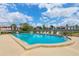 Large community pool with plenty of lounge chairs for relaxing and enjoying the Florida sunshine at 3690 Pinecrest St # 114, Sarasota, FL 34232