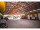 Spacious barn interior used for equipment storage and housing horses at 3717 Downer Ave, Sarasota, FL 34240