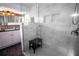 Contemporary bathroom with a marble-tiled shower and glass door at 3717 Downer Ave, Sarasota, FL 34240