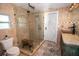 Bathroom features a stand alone glass shower, a rustic wooden bench, a toilet, and a decorative vanity at 3717 Downer Ave, Sarasota, FL 34240