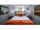 Bright bedroom with stylish decor, featuring a plush bed and decorative lamps at 3717 Downer Ave, Sarasota, FL 34240