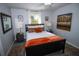 Well-lit bedroom with bedside tables, decorative lamps, and a comfortable bed at 3717 Downer Ave, Sarasota, FL 34240