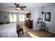 Serene bedroom with a vanity, ceiling fan, and ample natural light at 3717 Downer Ave, Sarasota, FL 34240