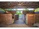 Horse barn showing four stalls with dutch doors at 3717 Downer Ave, Sarasota, FL 34240